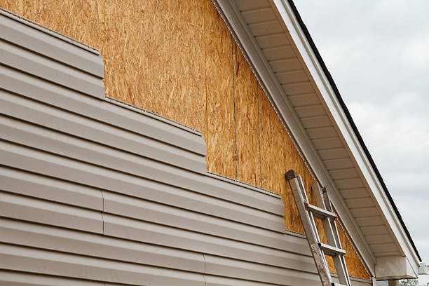 Professional Siding Installation technician working in Canton, OH